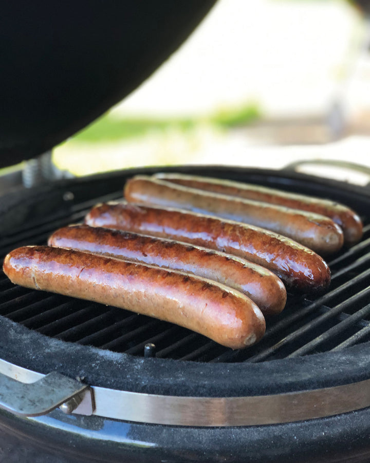 Saftige Grillwurst – Perfekt gegrillt mit goldbrauner Kruste und herzhaftem Aroma.